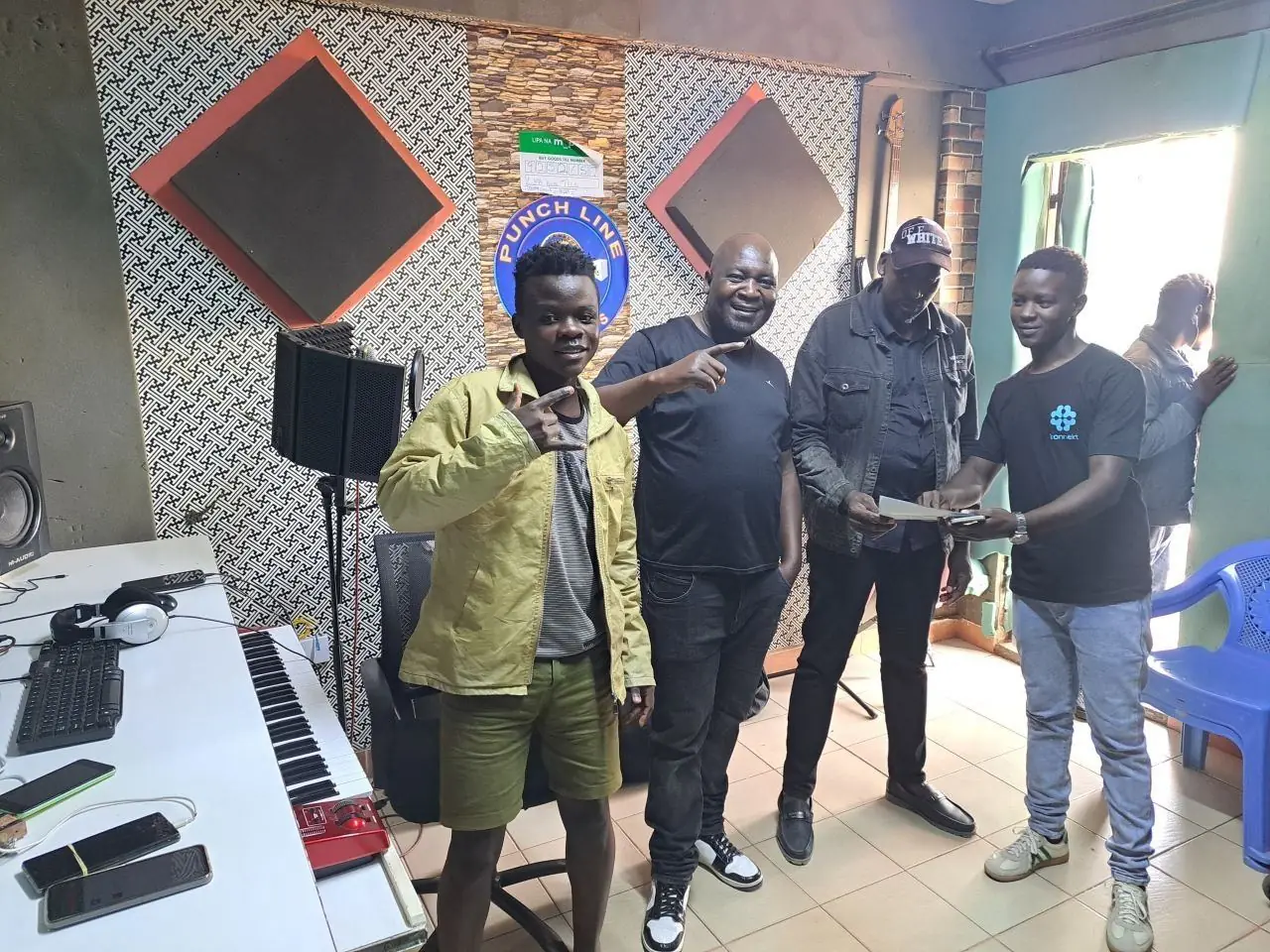 Visiting a local music studio during the trip.